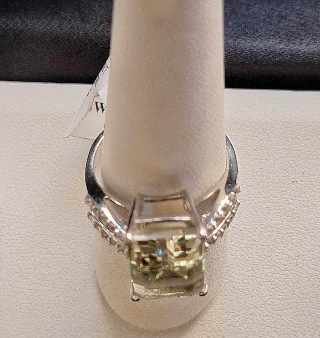 8.00CT Emerald Cut Brazilian Prasiolite with .31CTW Round White Topaz
