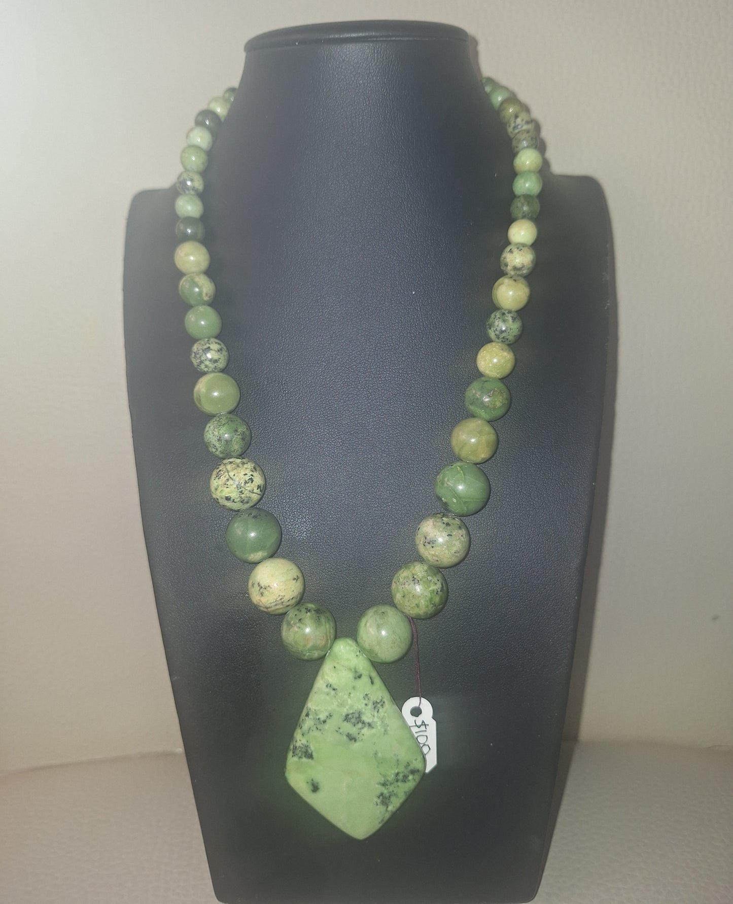 Green Turquoise Necklace and Diamond shaped Pendant with a Sterling Silver 925 Chain Closure.