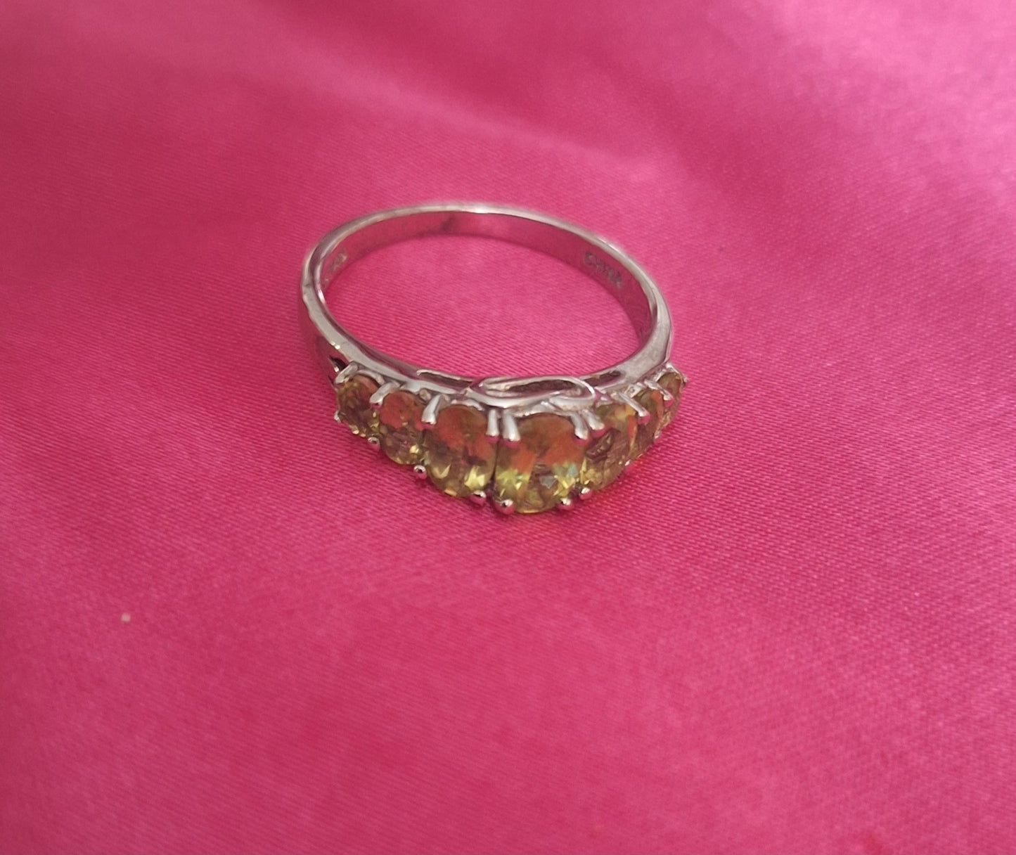 Eternity seven stone peridot band