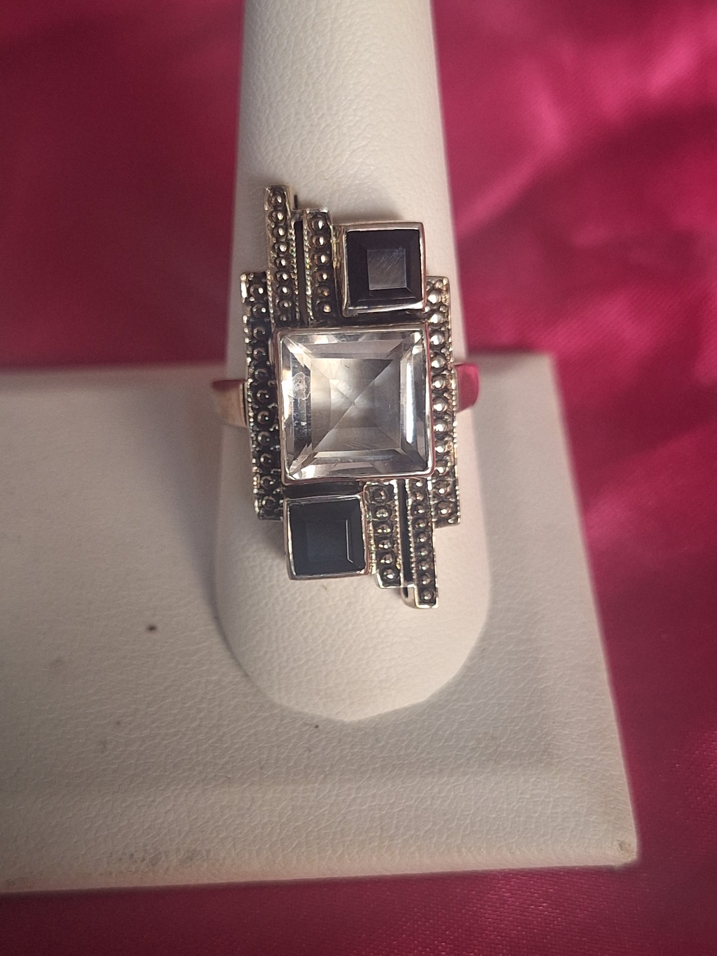 Geometric Clear Topaz Black Spinal Ring