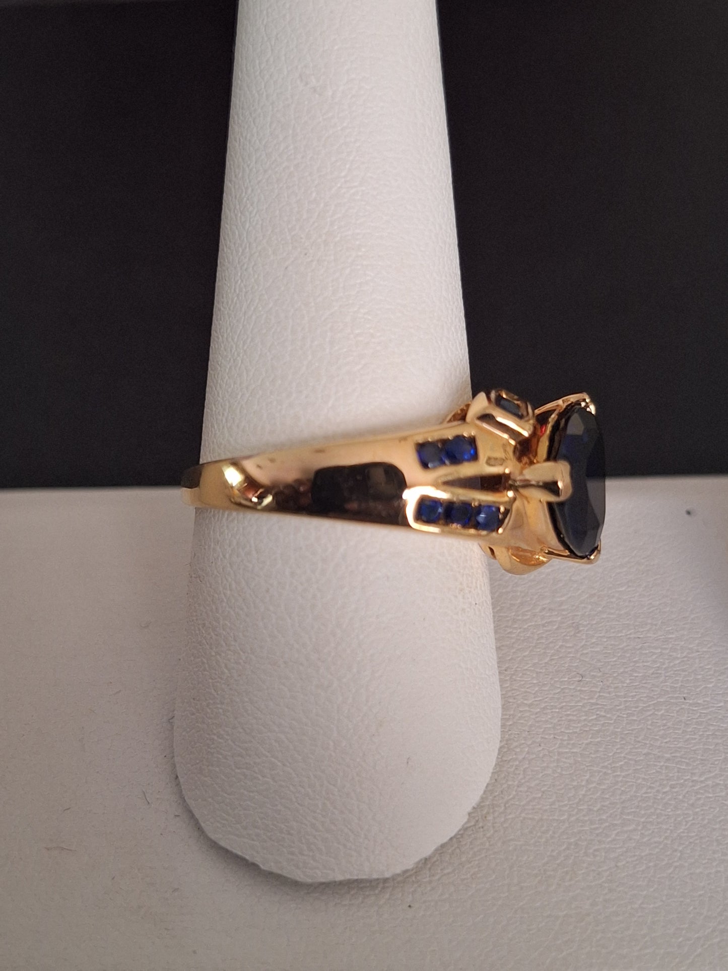Yellow-Tone Sterling Silver Trillion Round Cut Synthetic Sapphire Ring