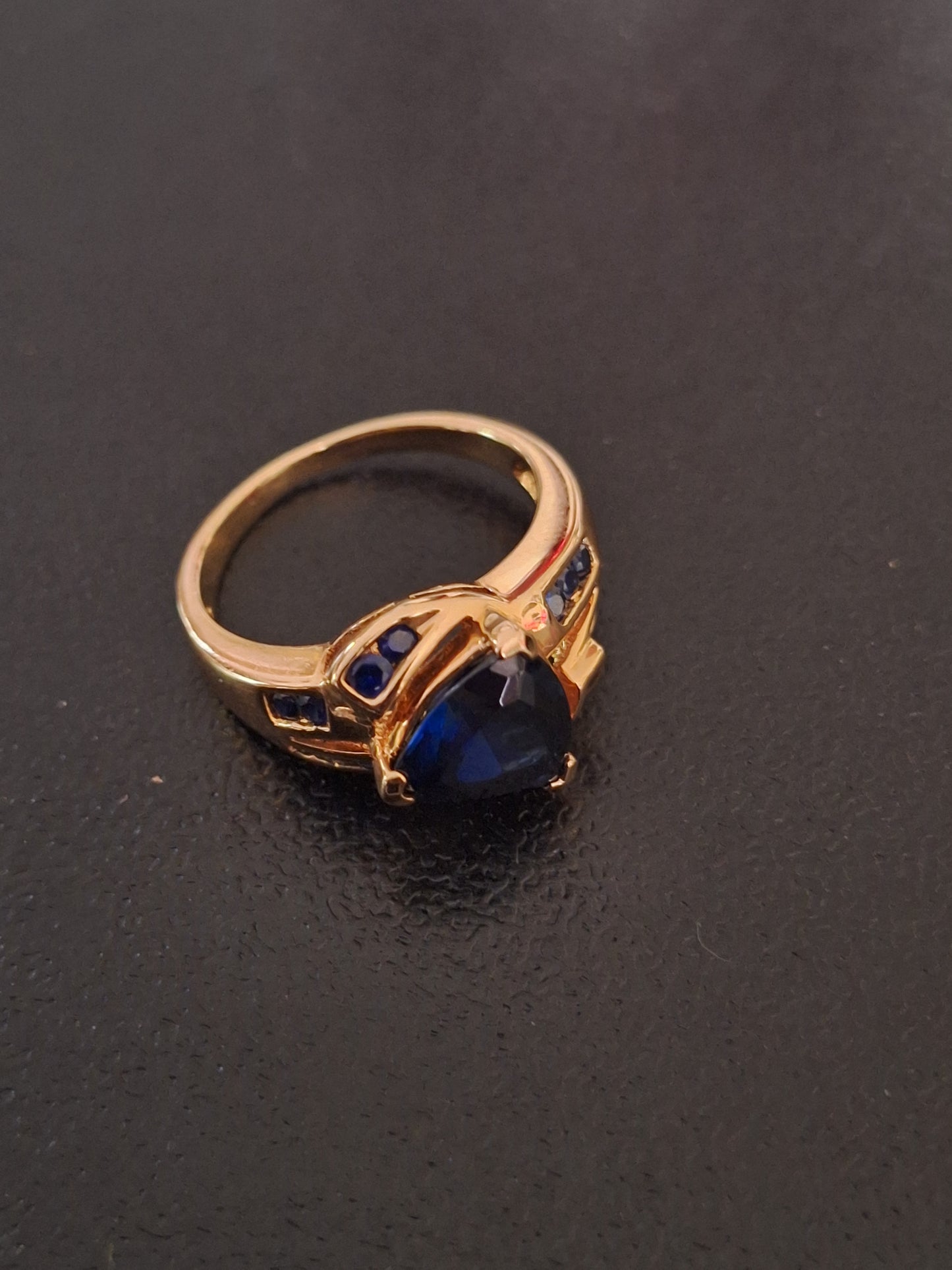 Yellow-Tone Sterling Silver Trillion Round Cut Synthetic Sapphire Ring