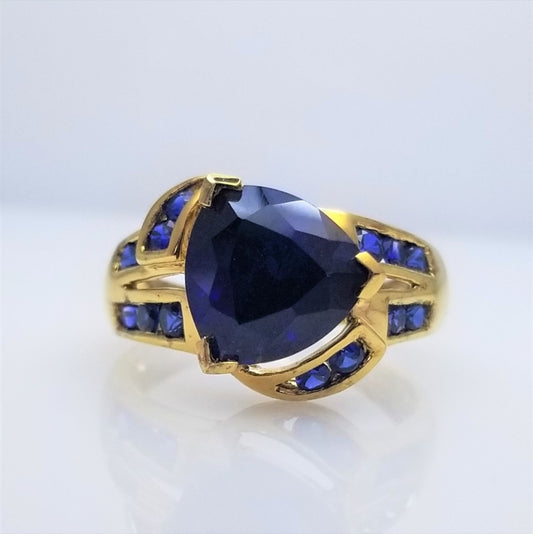 Yellow-Tone Sterling Silver Trillion Round Cut Synthetic Sapphire Ring