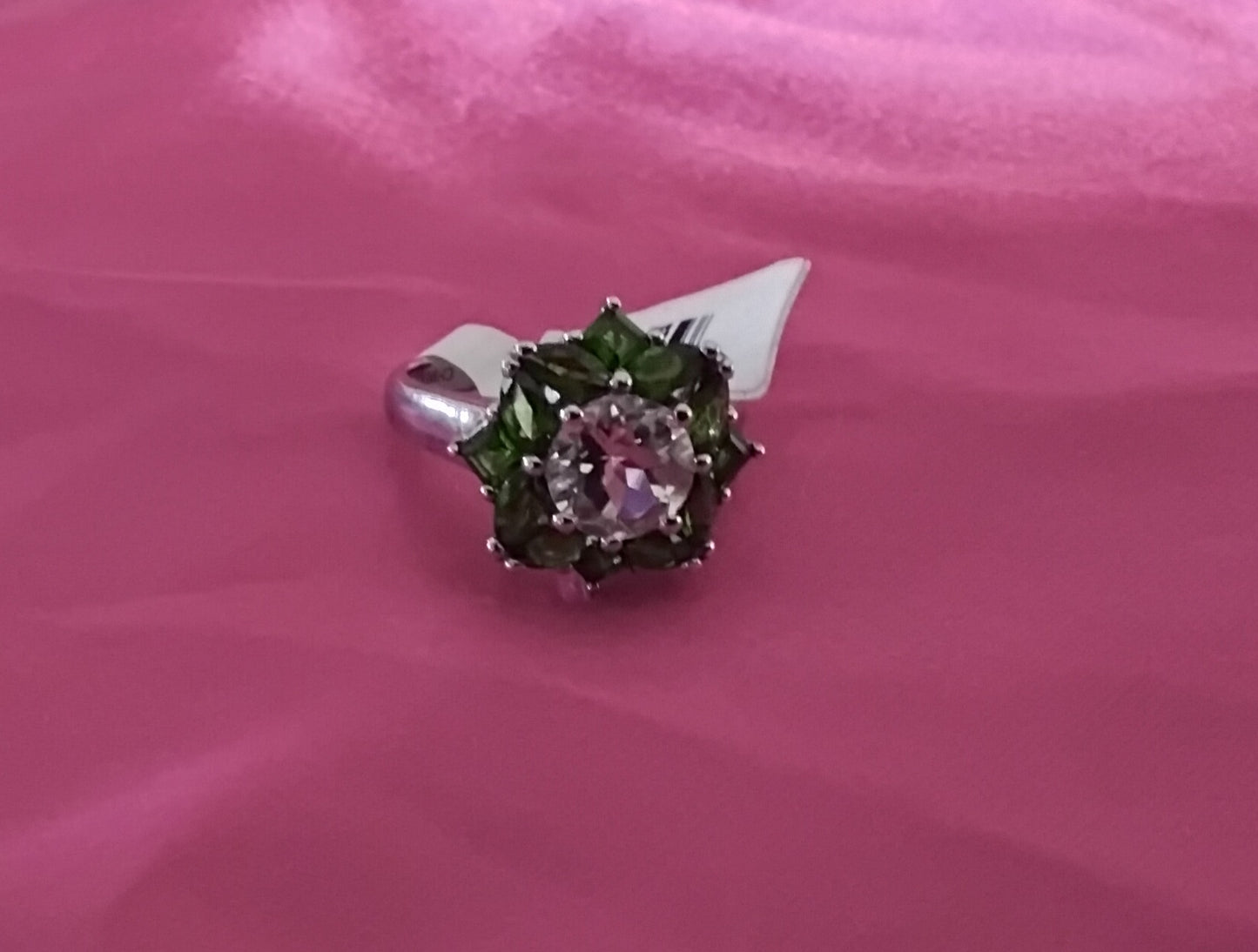 A Sterling Silver Round Cut Prasiolite and Peridot Ring