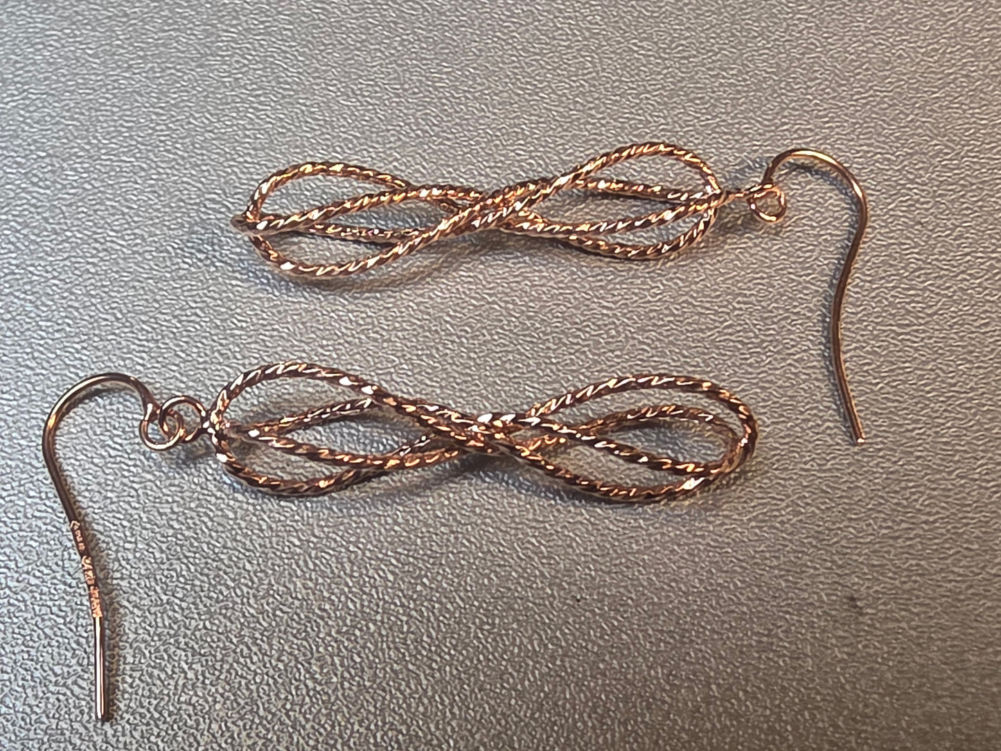 14k Gold twisted infinity dangle earrings