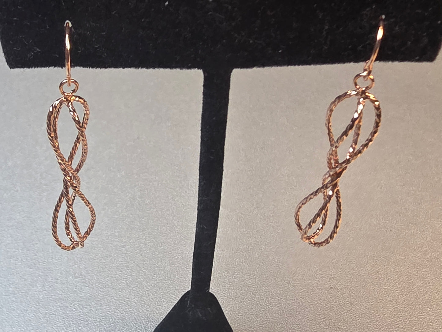 14k Gold twisted infinity dangle earrings