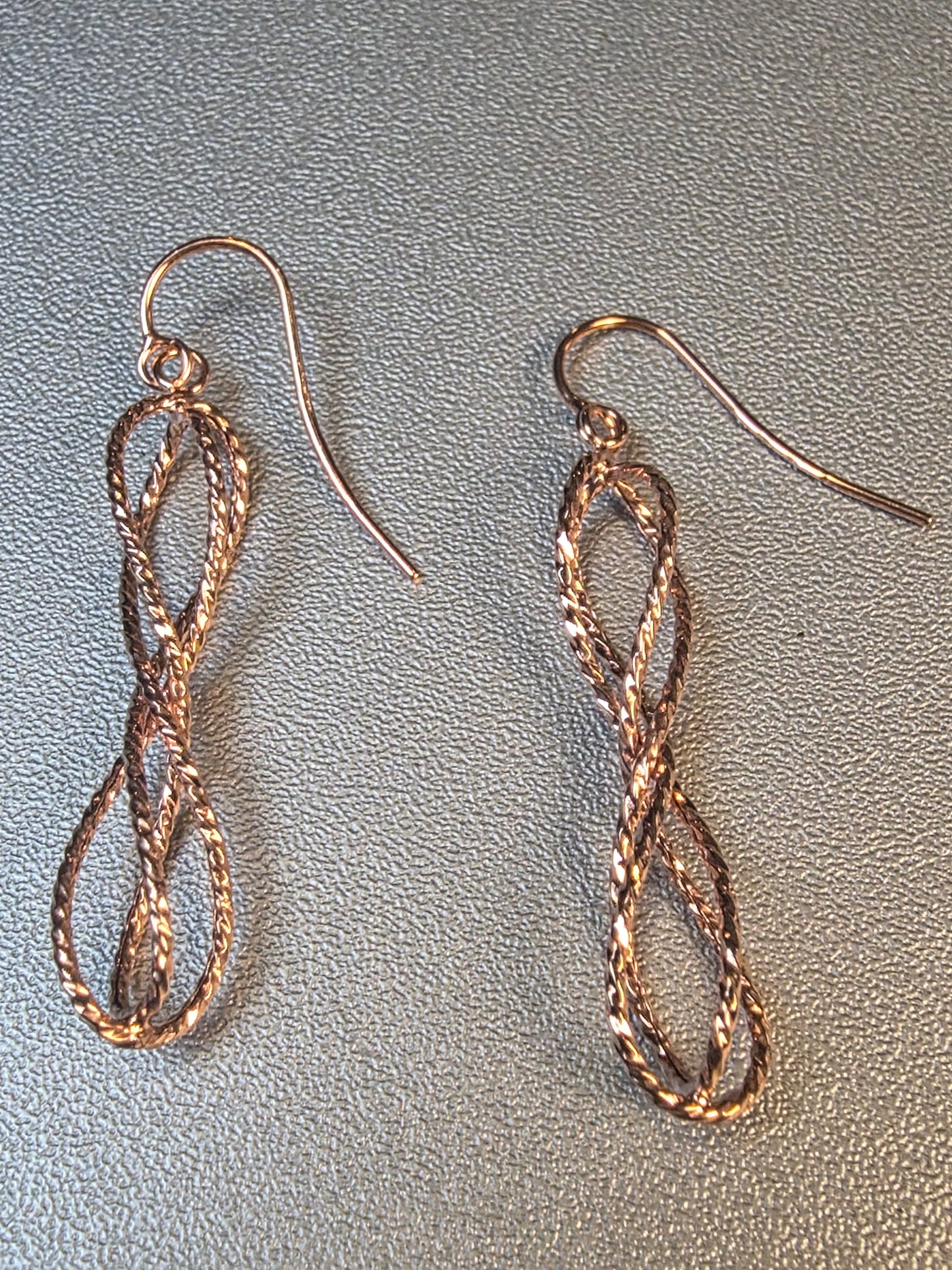 14k Gold twisted infinity dangle earrings
